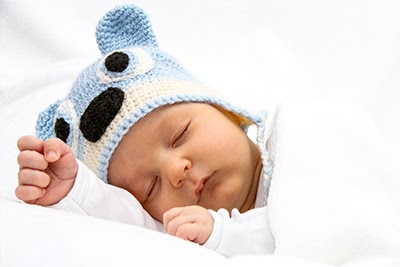 baby sleeping on side