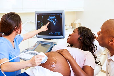 pregnant woman having ultrasound