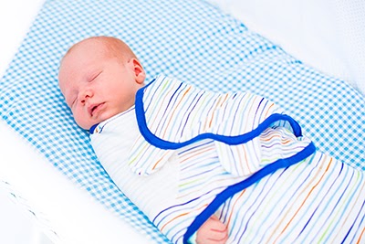 Little swaddled baby sleeping